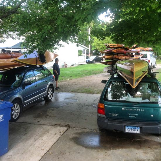 Wooden Kayaks on cars and trailer
