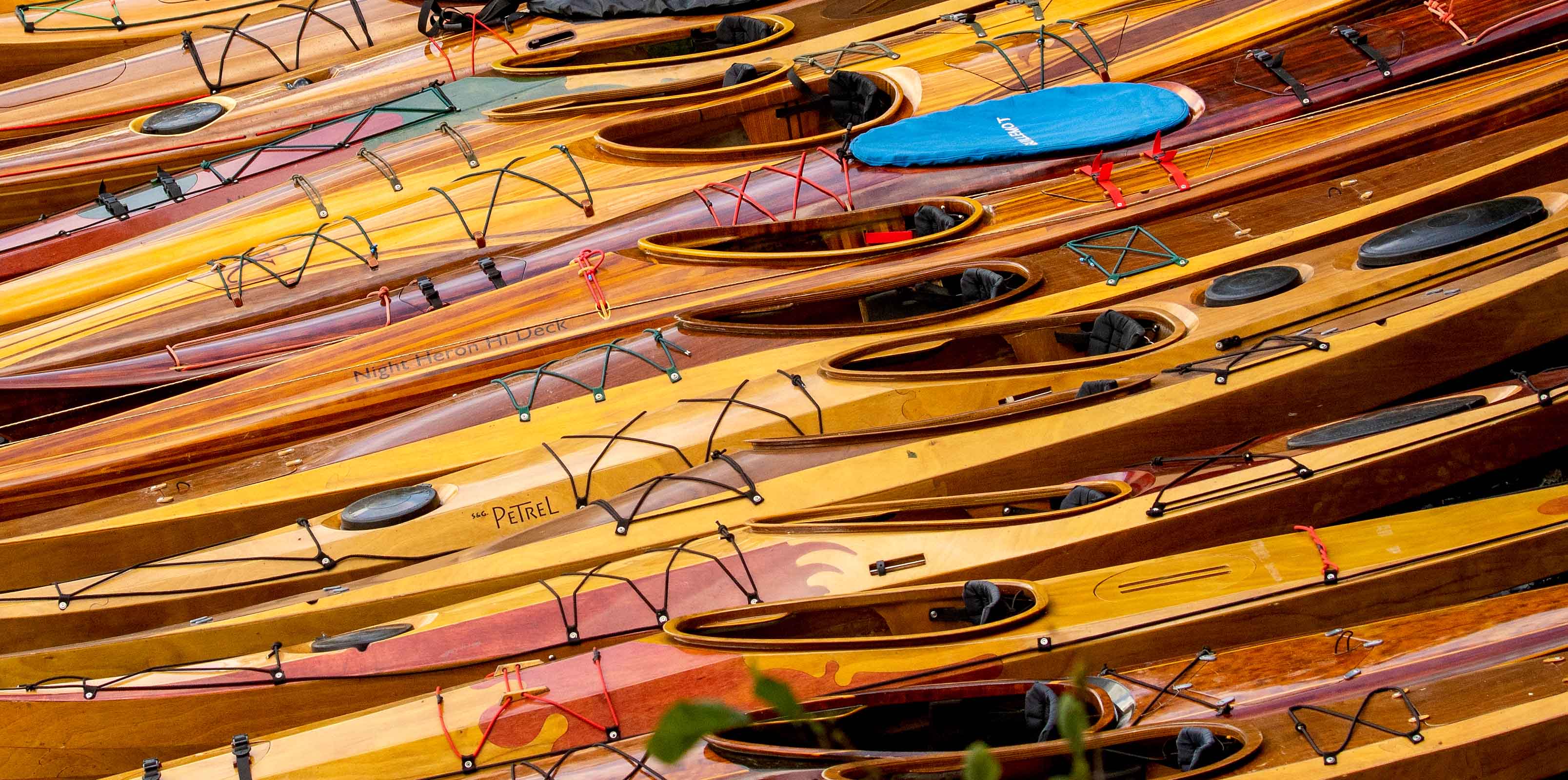 Wooden kayaks on the beach