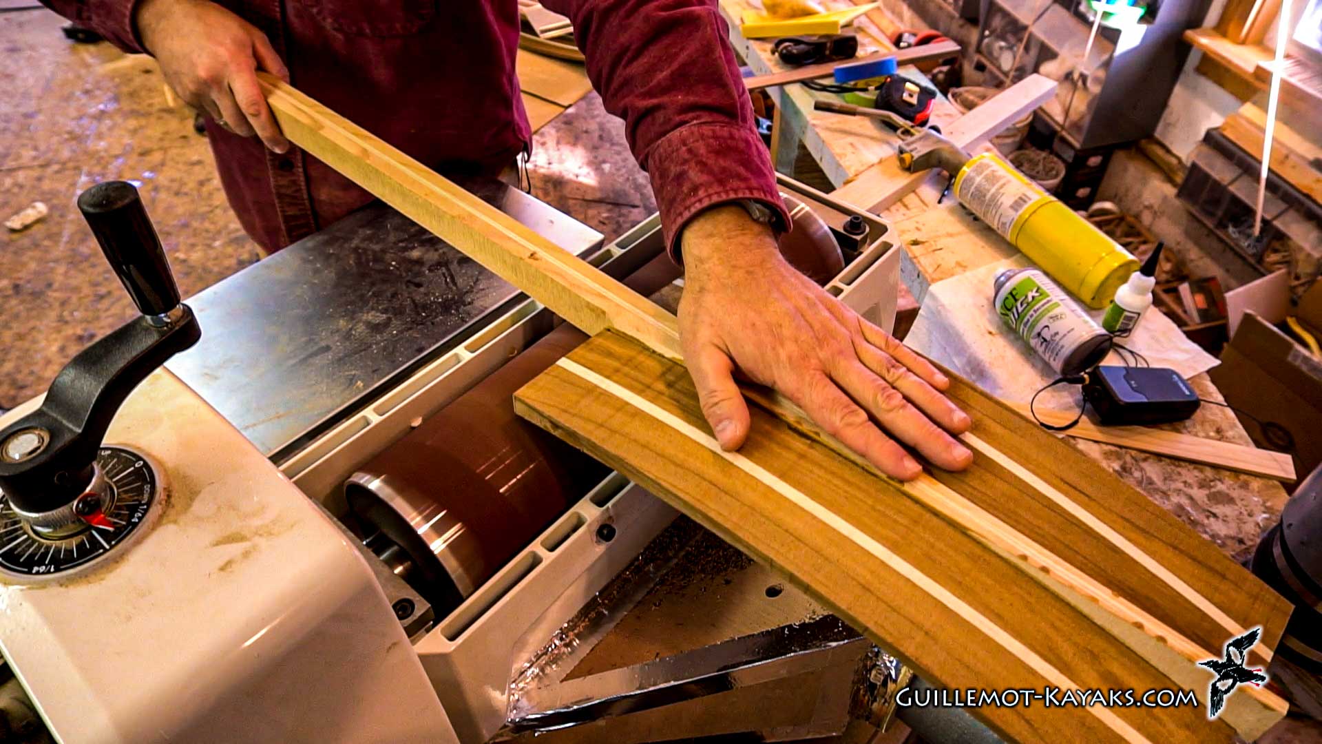 Sanding the power face of a kayak paddle