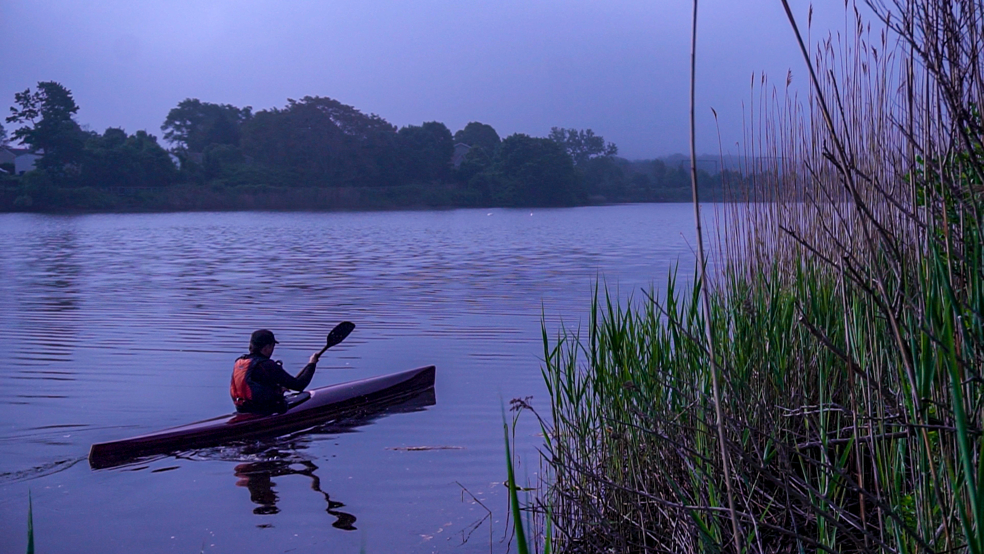 Launching microBootlegger Sport sea kayak