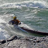 Nick Schade paddling the Petrel at the Narrow River in Rhode Island