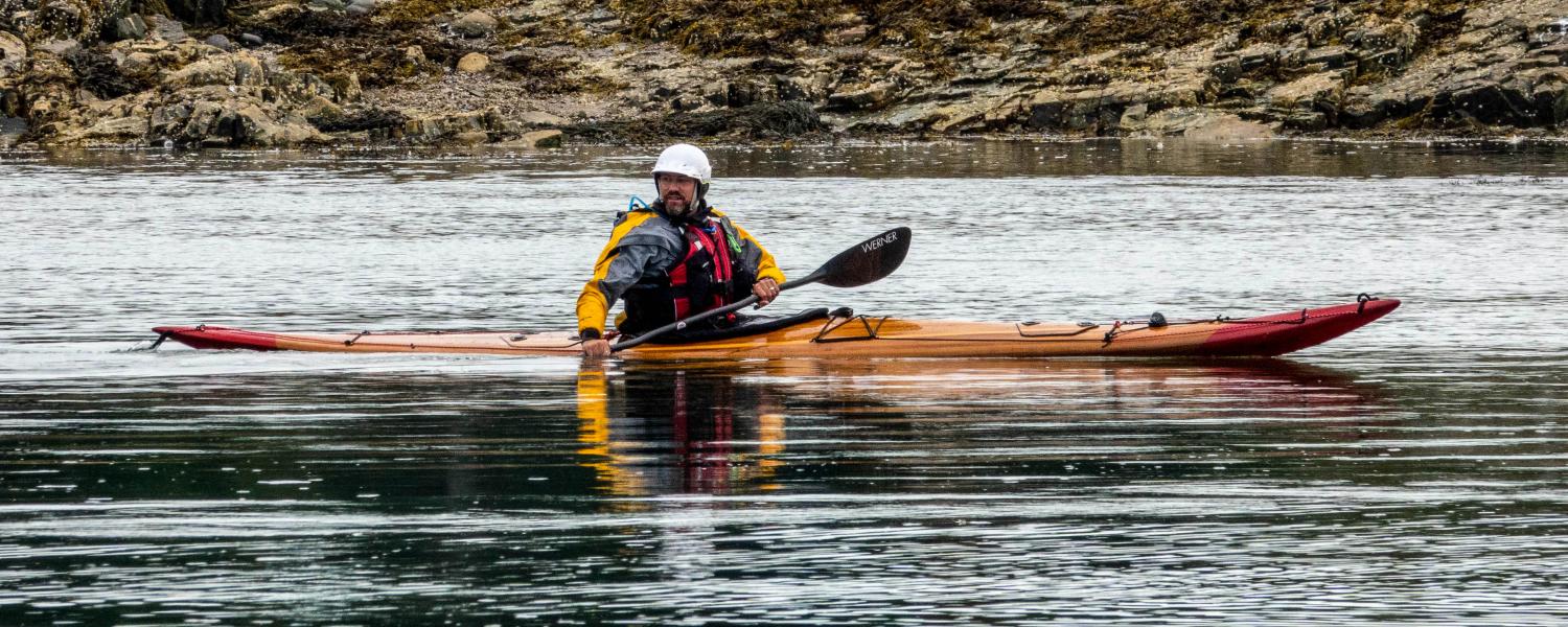 Dave in Guillemot Play wood kayak