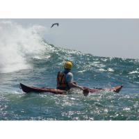 Petrel Strip Built Sea Kayak in Big Waves